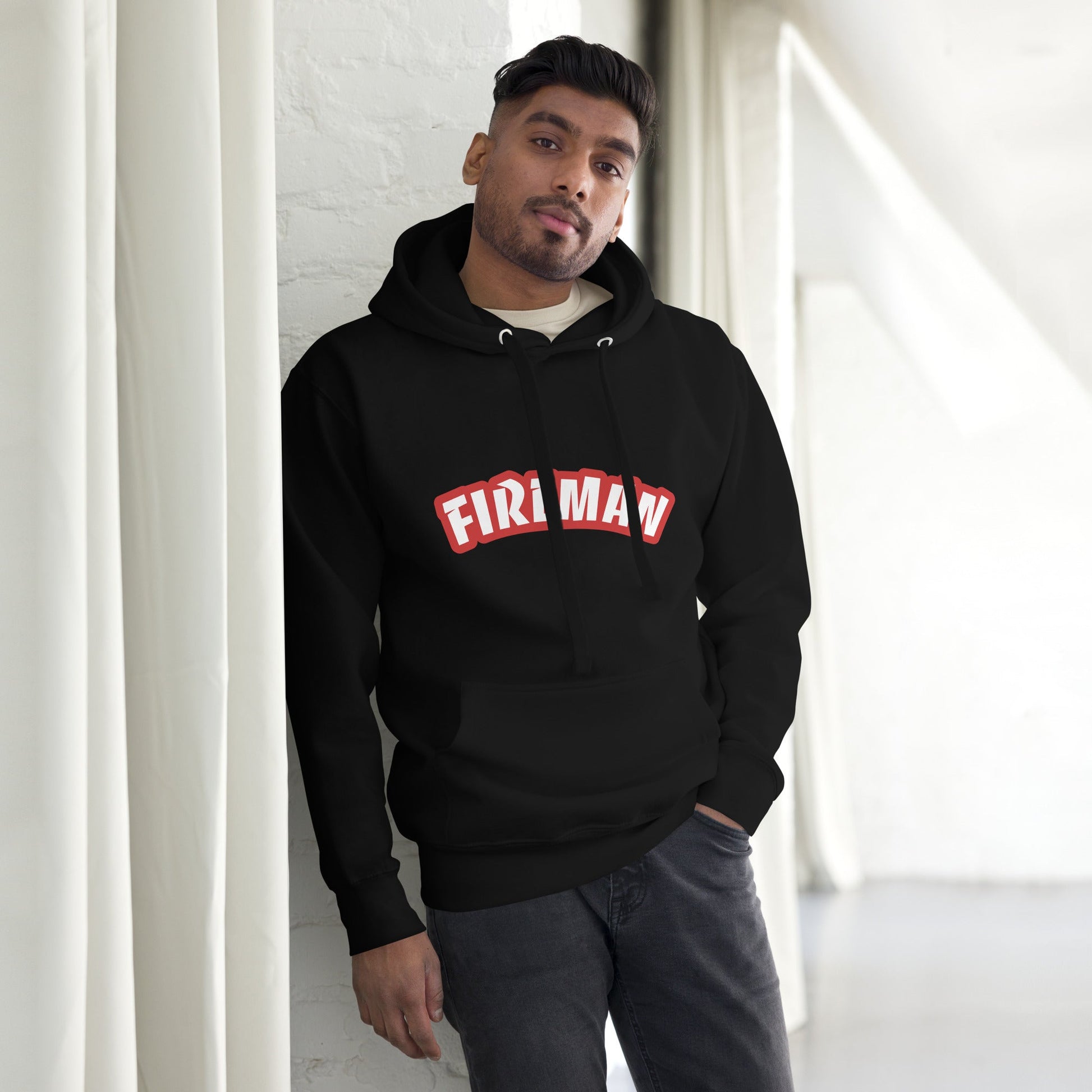 Man wearing Black hoodie with Fireman text on white canvas background