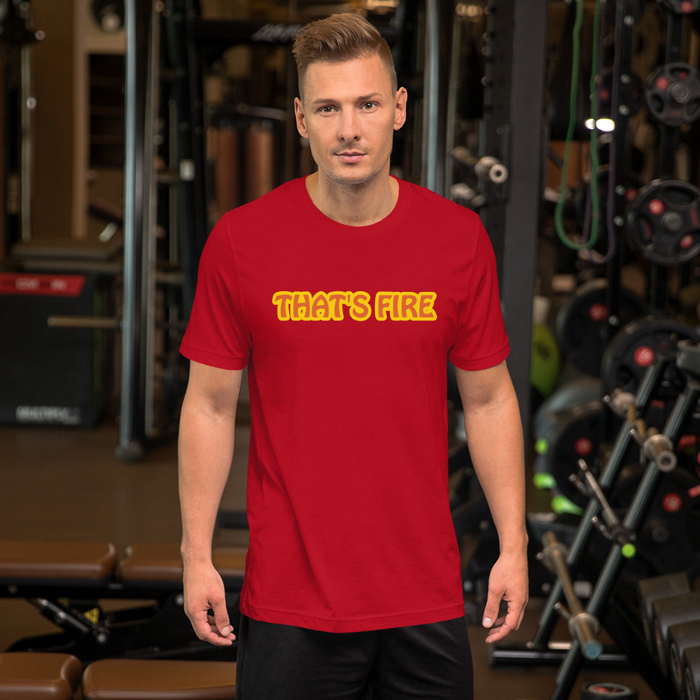 Man wearing red shirt with That's Fire text in exercise gym room 